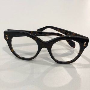 Alexander McQueen reading glasses.
